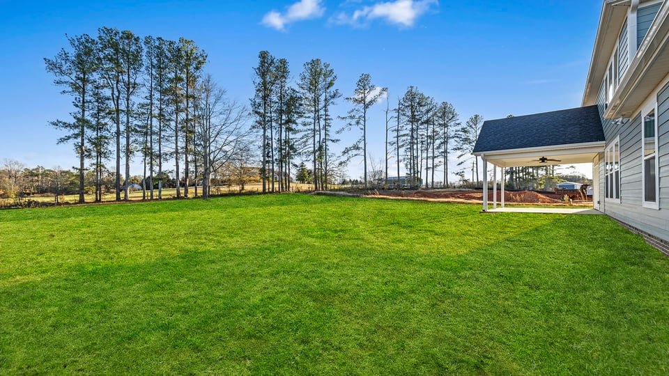 Large backyard of home.