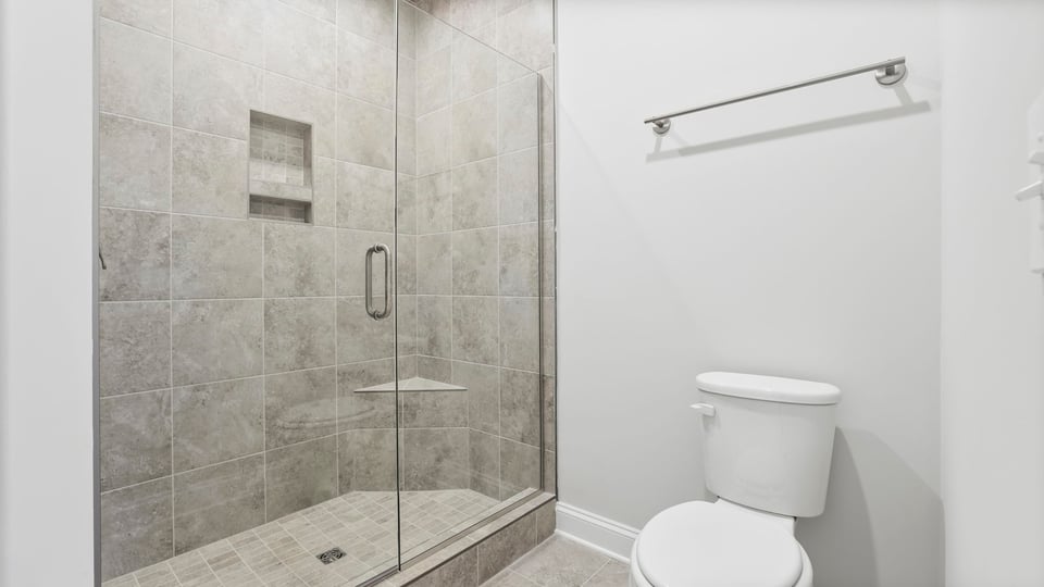 Bathroom with walk in shower.