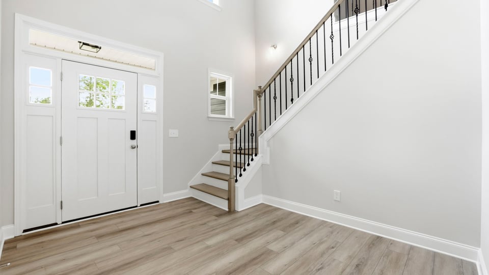 Family room with view of stairs.