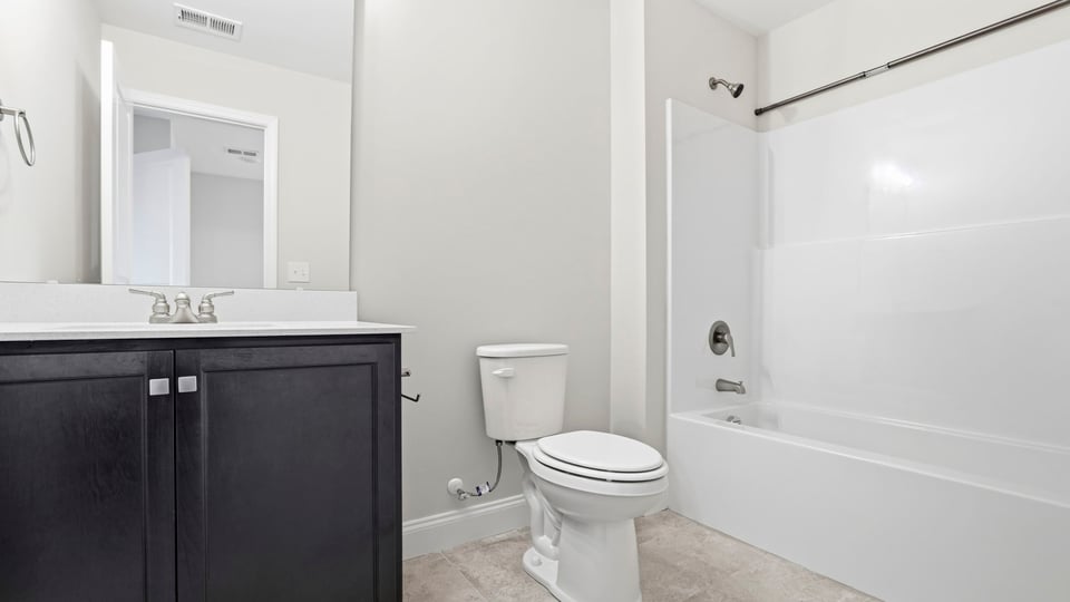 Bathroom with sink and bathtub..