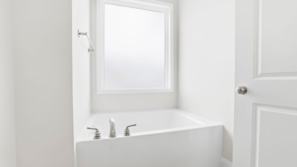 Bathroom with bathtub.