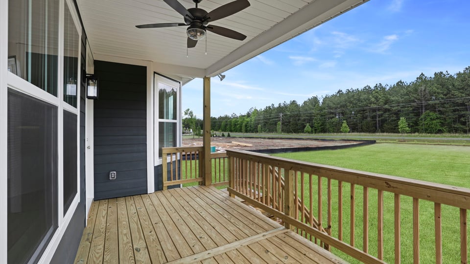 Covered porch at back of home.