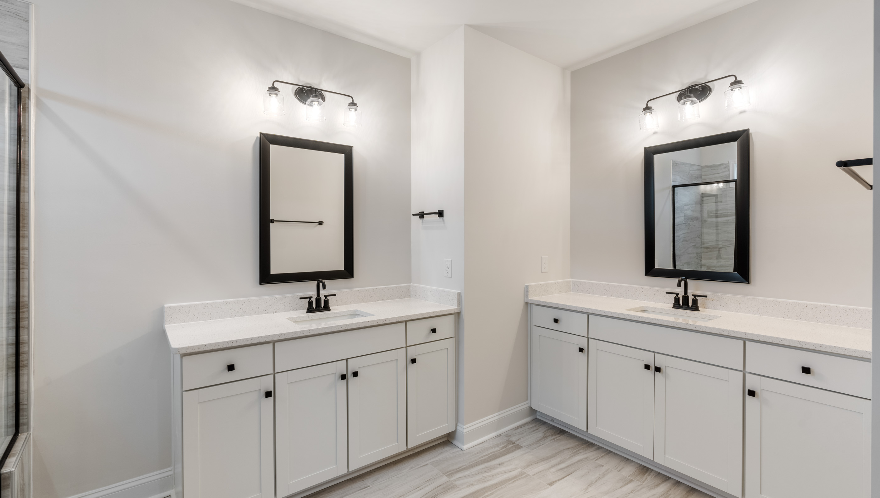 Bathroom with double vanity sinks.