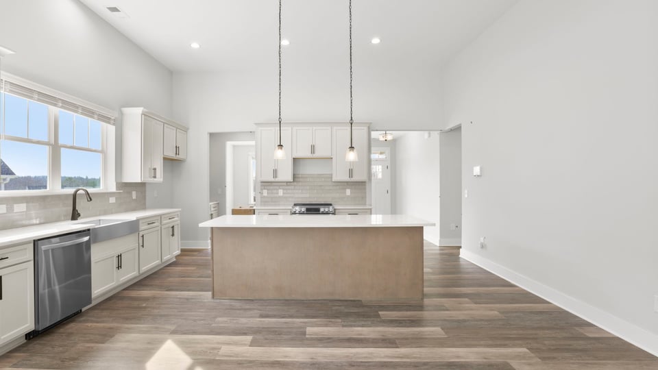 Family room with view of kitchen.