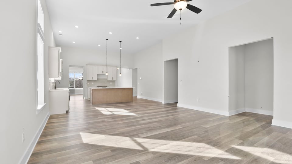 Family room with windows and fireplace.