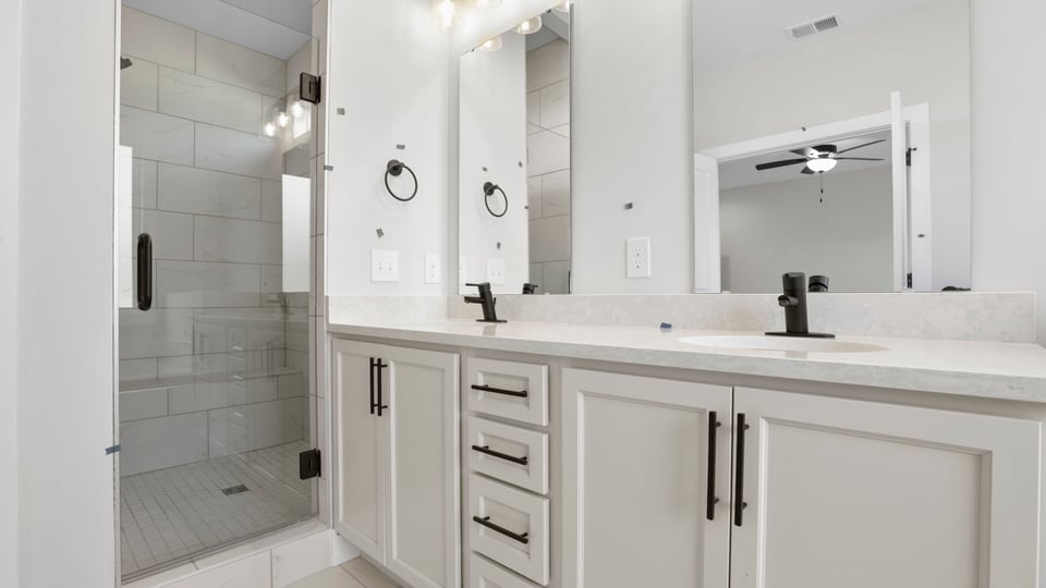 Bathroom with double vanity sink.