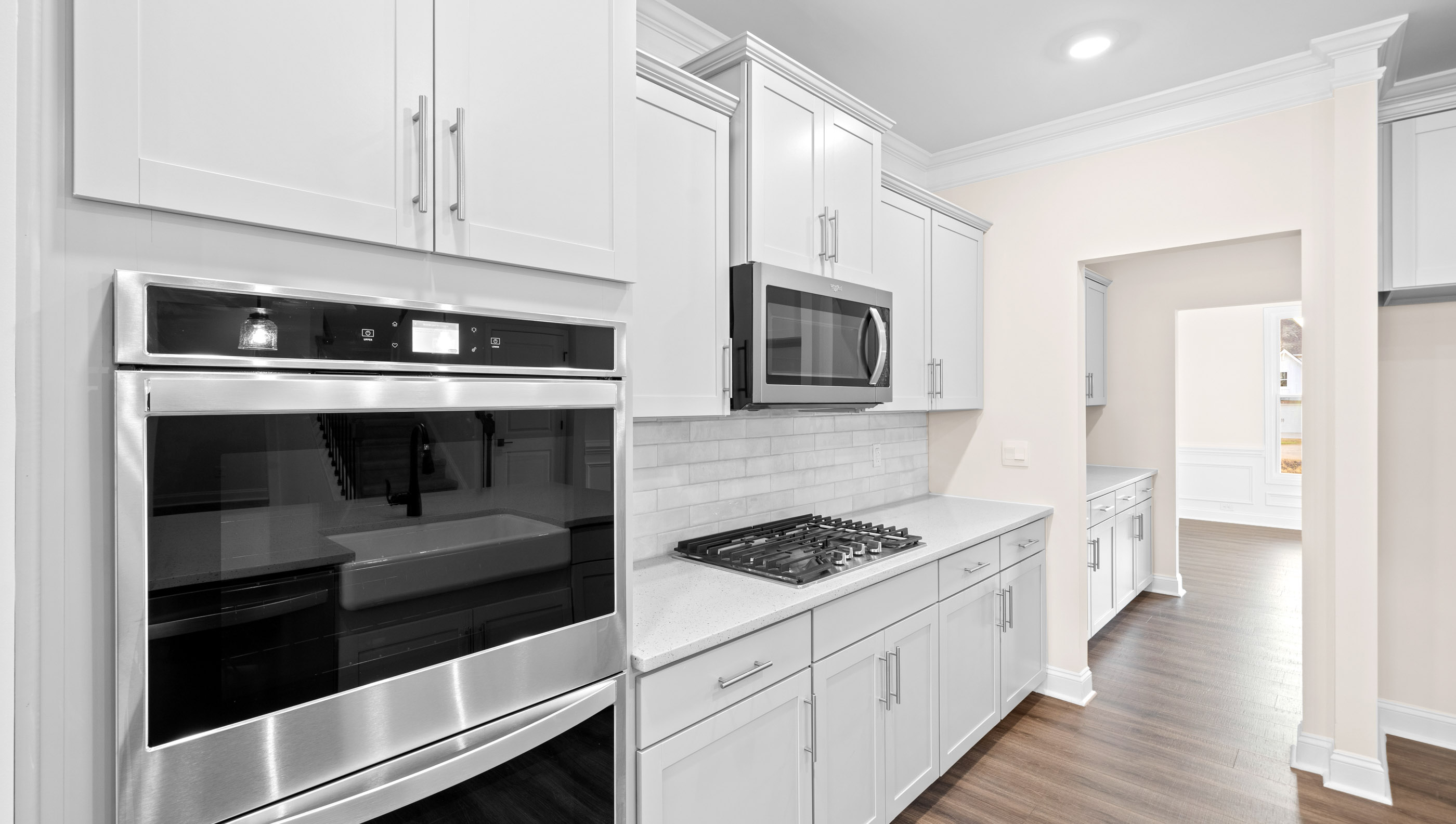 Kitchen with countertops and island of home.