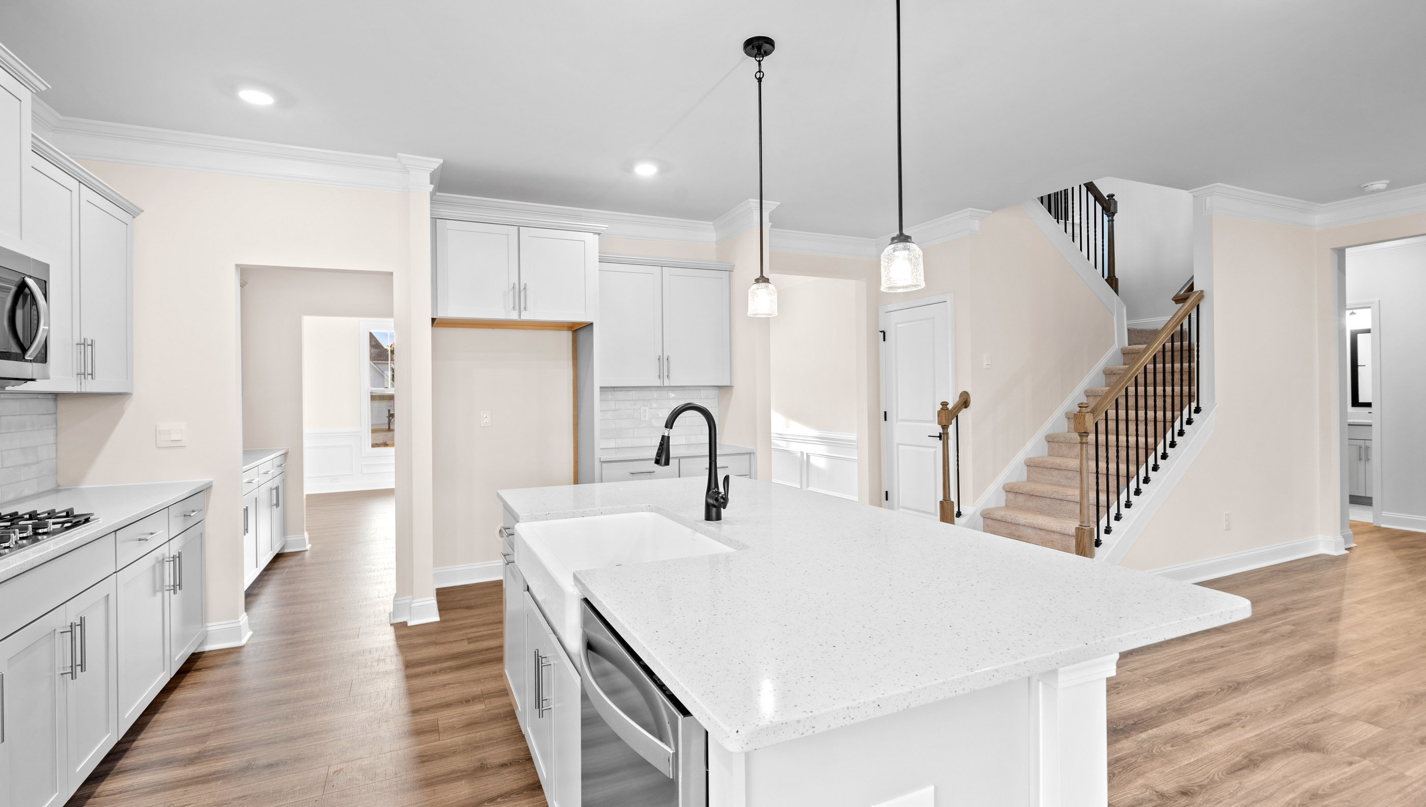 Kitchen with countertops and island of home.