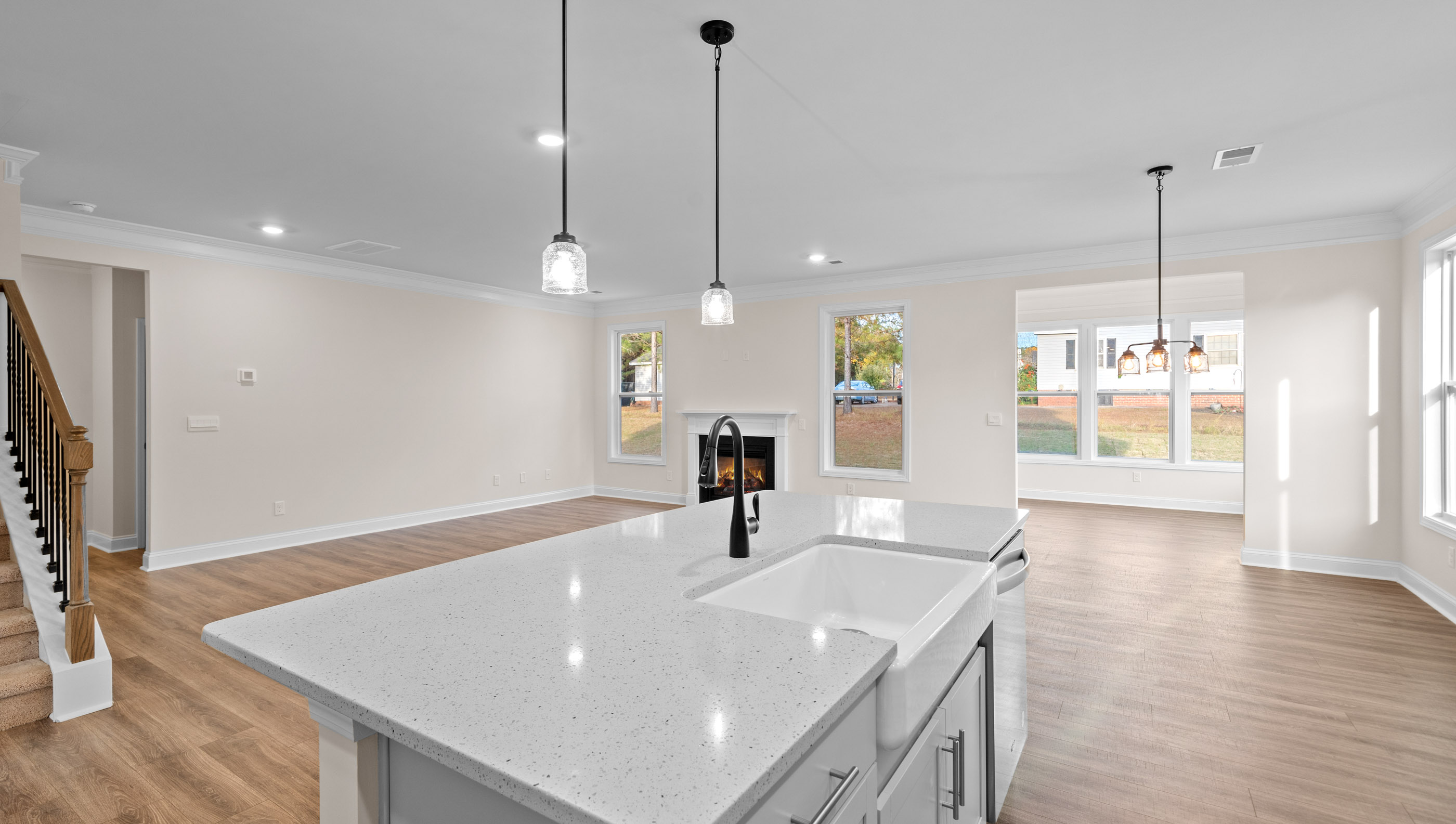 Kitchen with countertops and island of home.