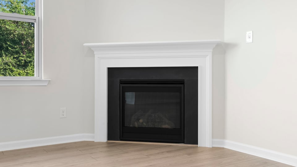Livingroom with window and fireplace.