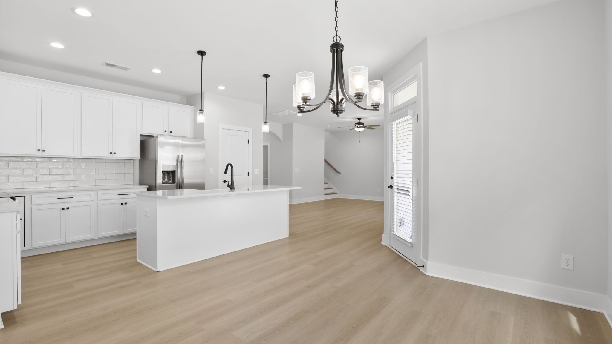 Family room with windows.