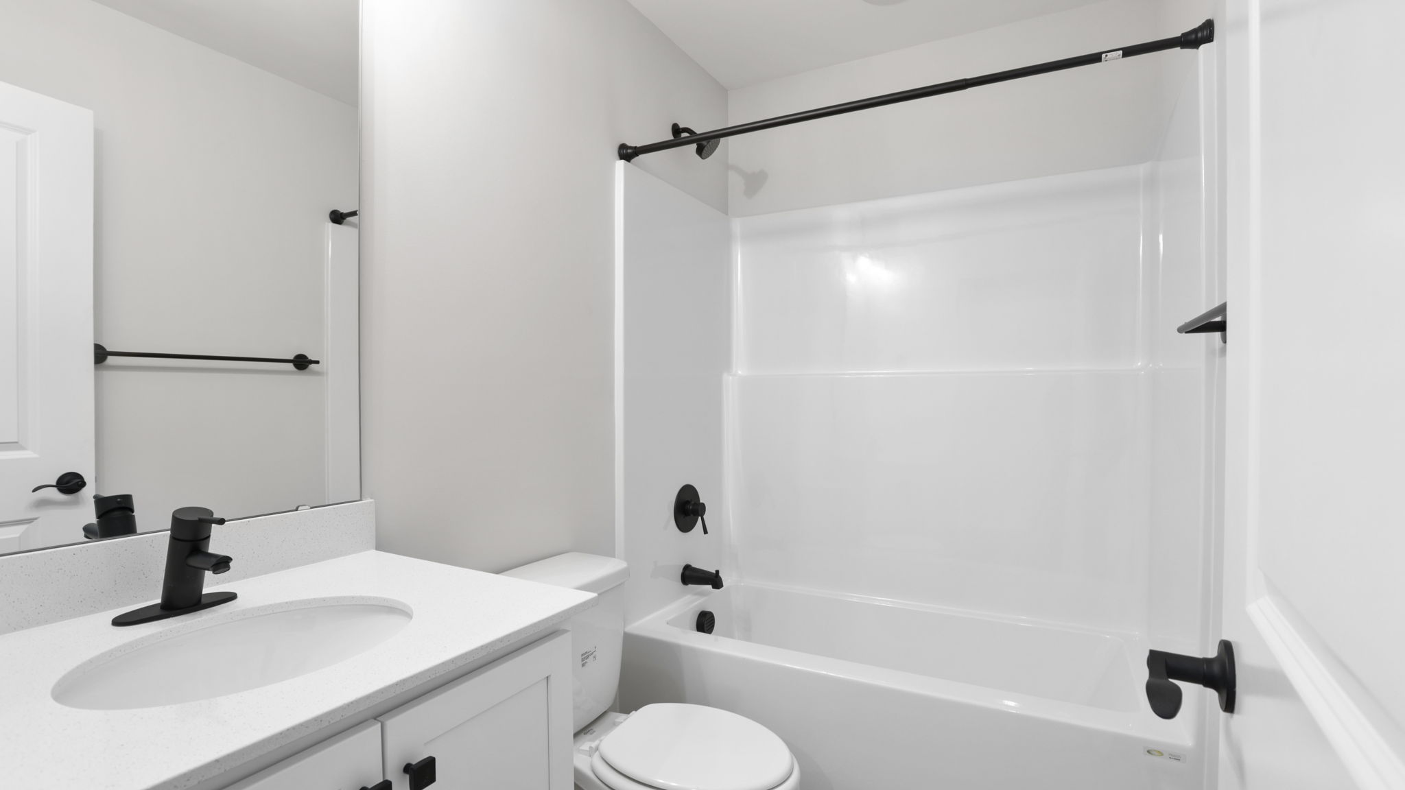 Bathroom with single vanity sink and shower.