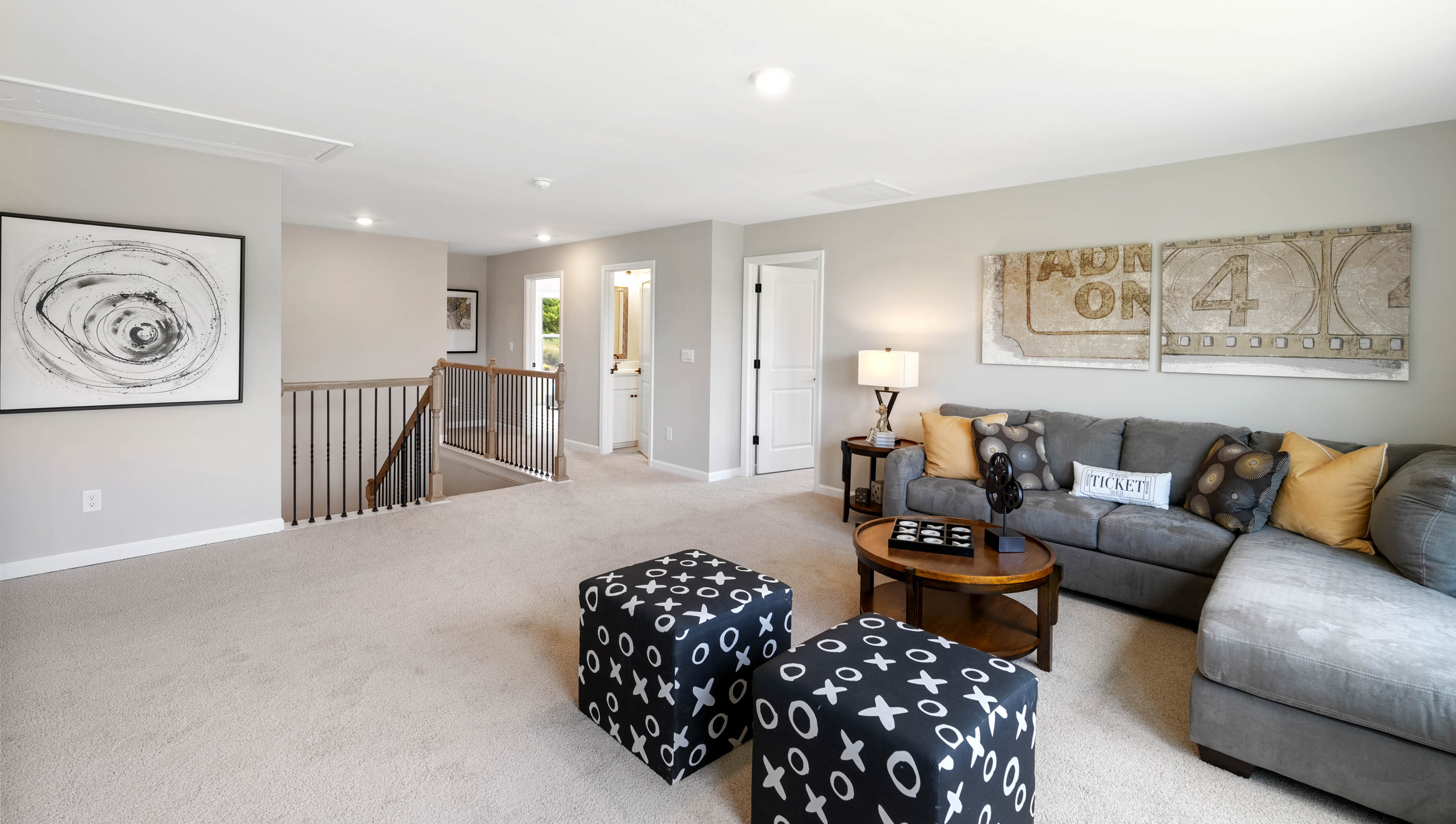 Loft area of home with windows.