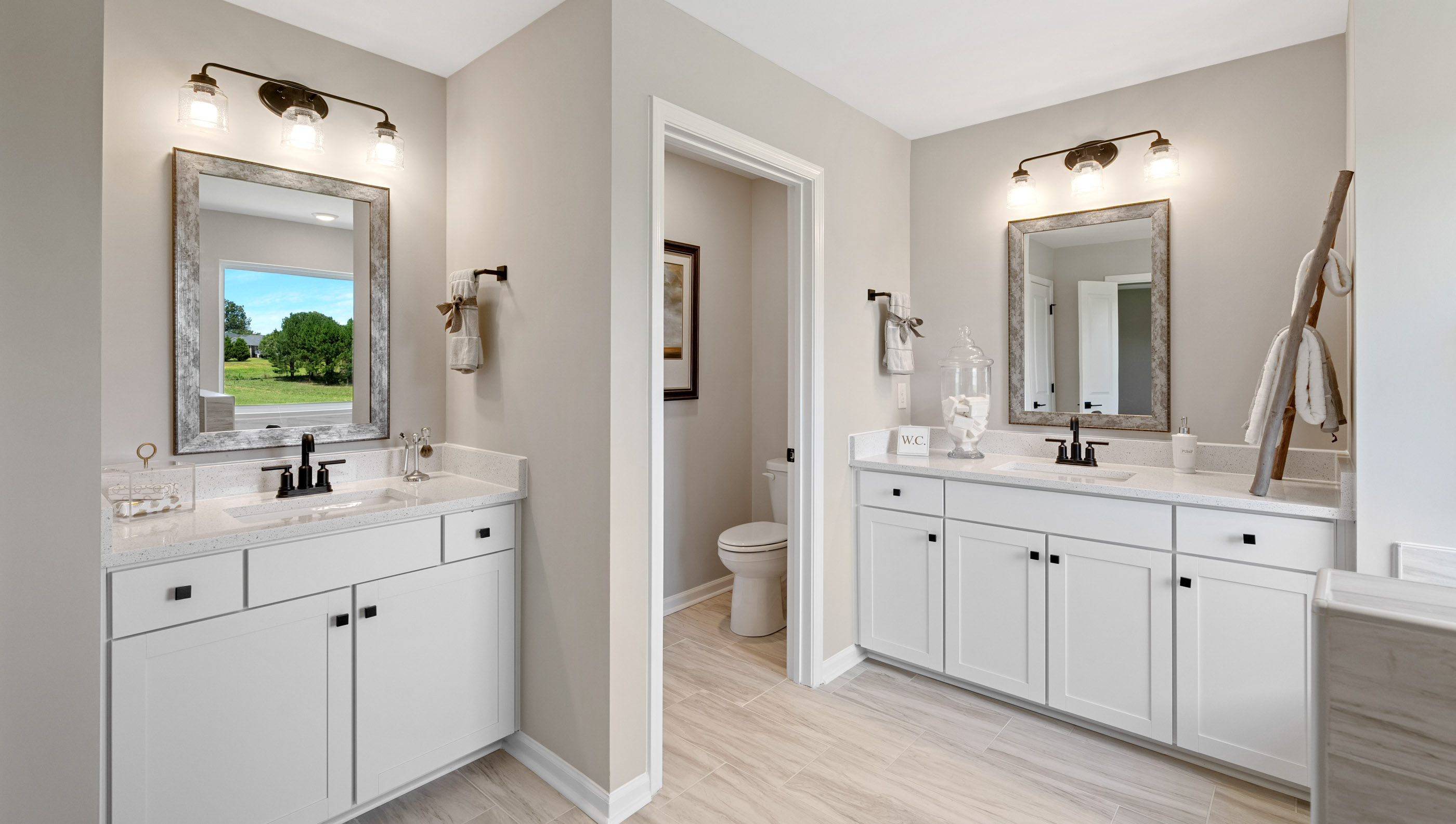 Primary bathroom with vanity and shower.