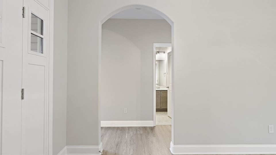 Entrance and view of arched doorway.