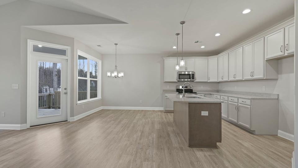 View of kitchen and dining area.