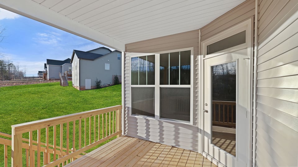 Back porch with large backyard.