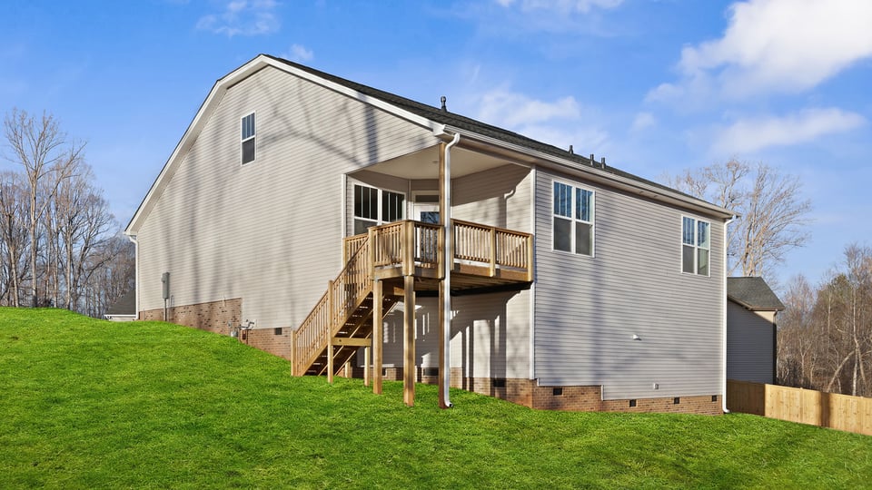 Back porch with large backyard.
