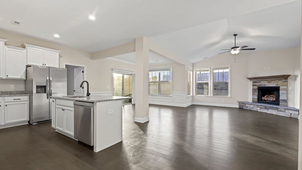 Kitchen with island and cabinets.