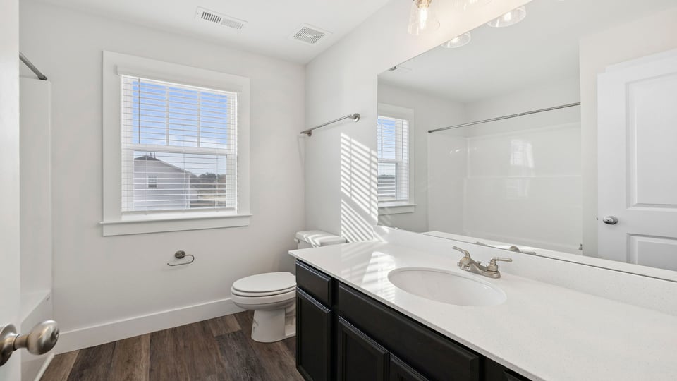Bathroom with vanity sink.