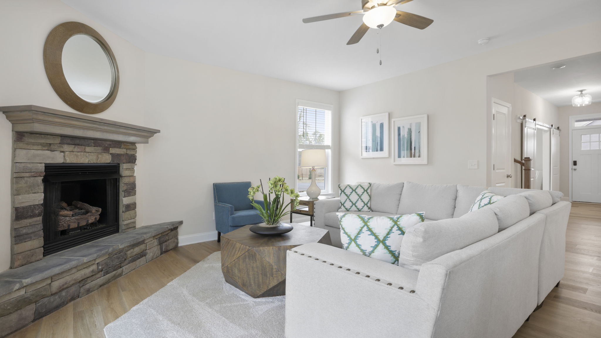 Family room with windows and fireplace.