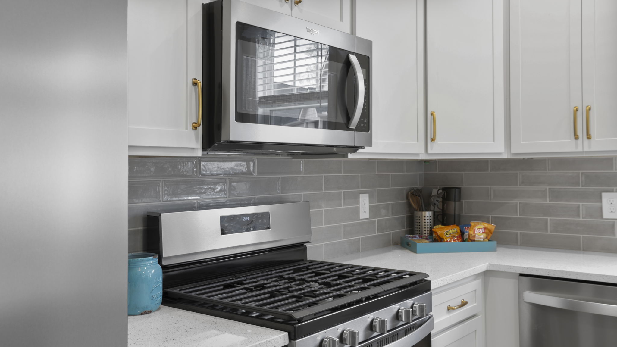 Kitchen with granite counter tops.