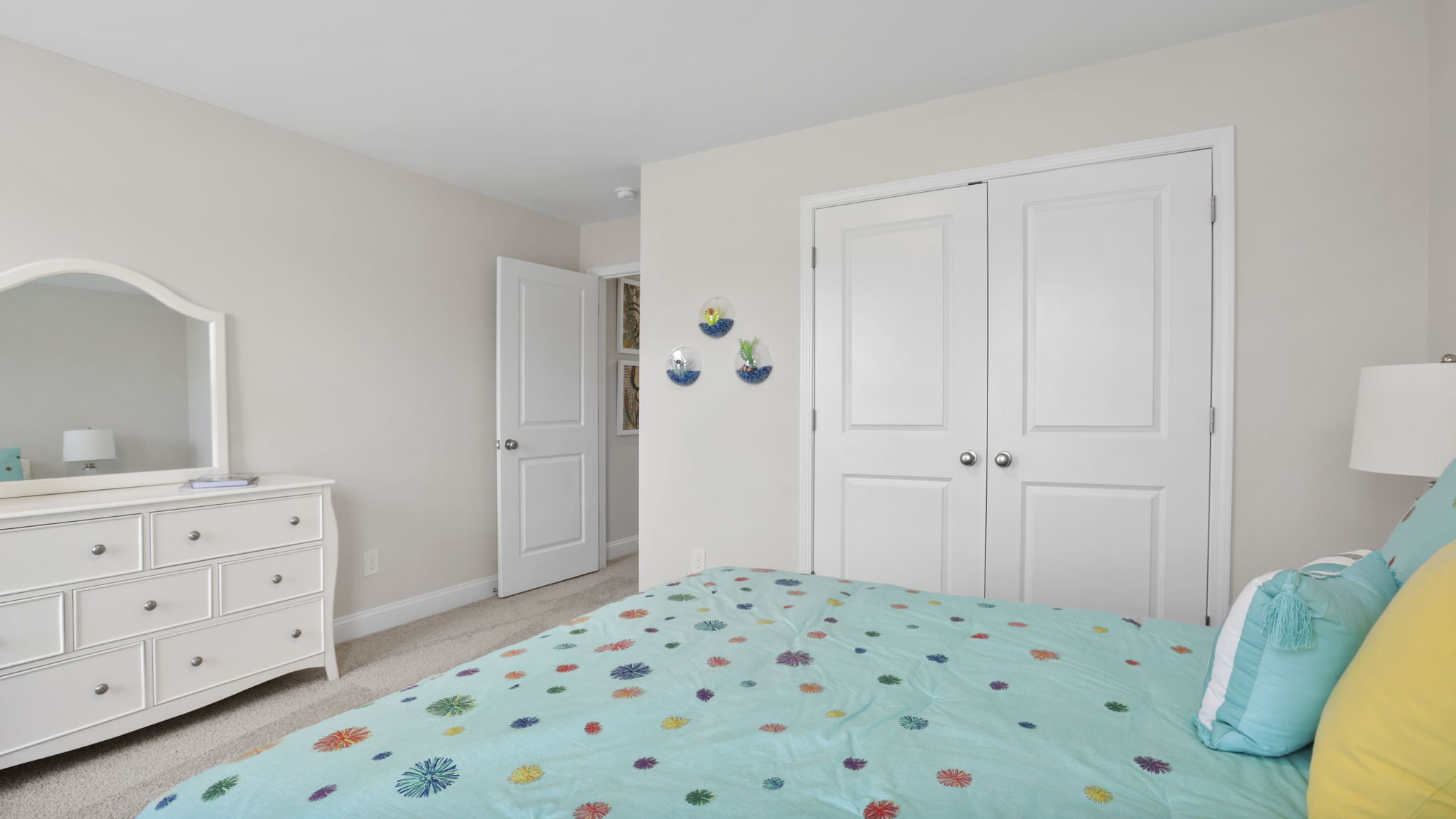 Bedroom with carpet and window.