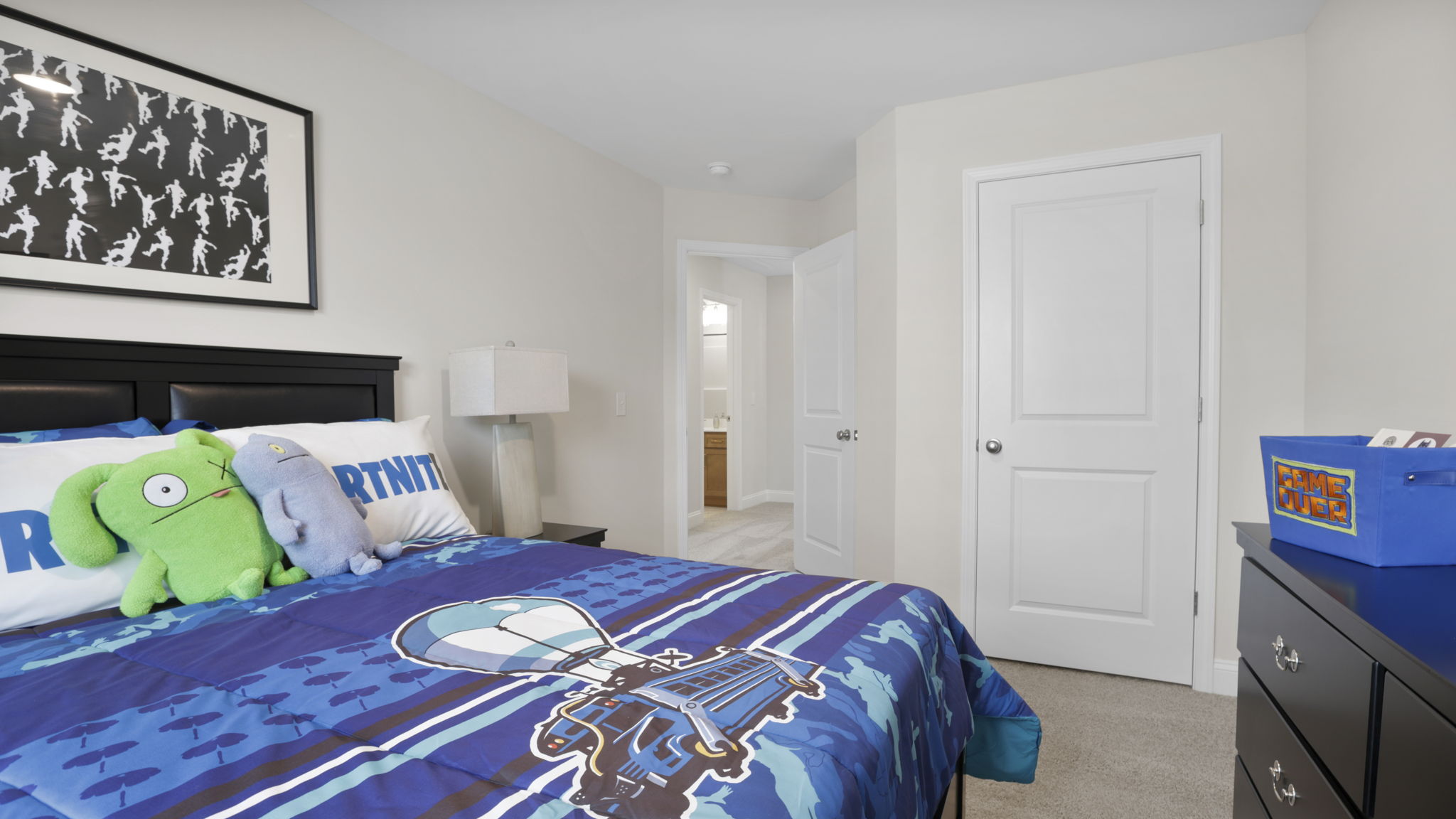 Bedroom with carpet and window.