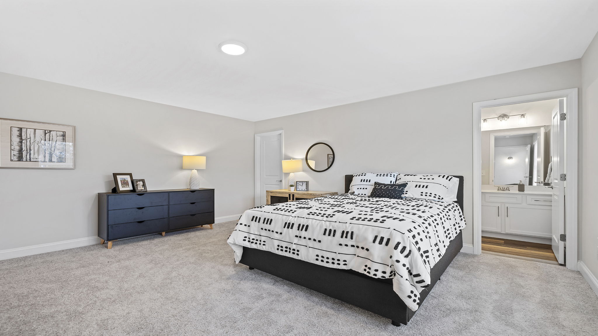 Bedroom with carpet and window.