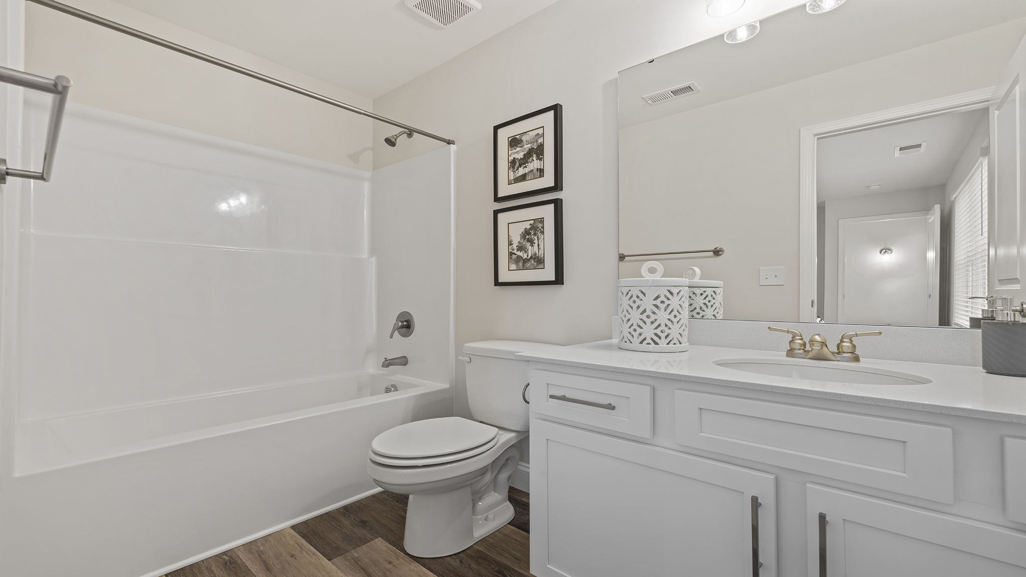 Primary bathroom with double vanity sinks.