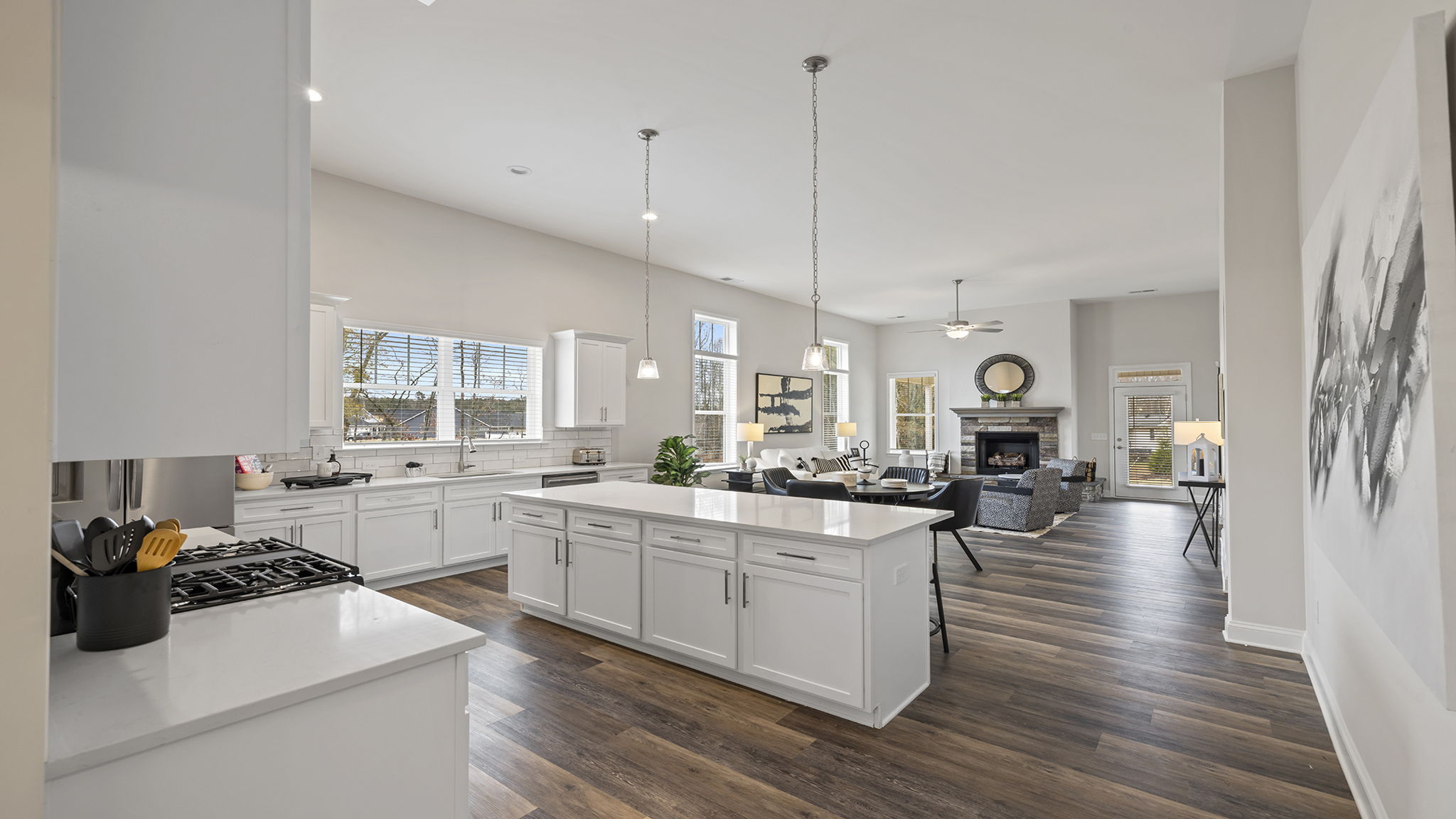 Kitchen with island and cabinets.