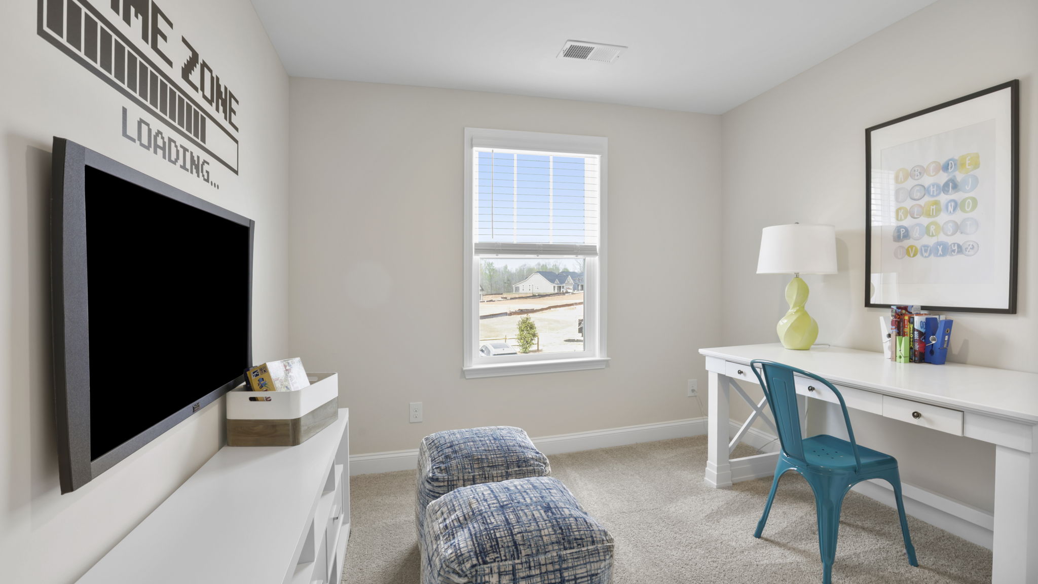Bedroom with carpet and window.