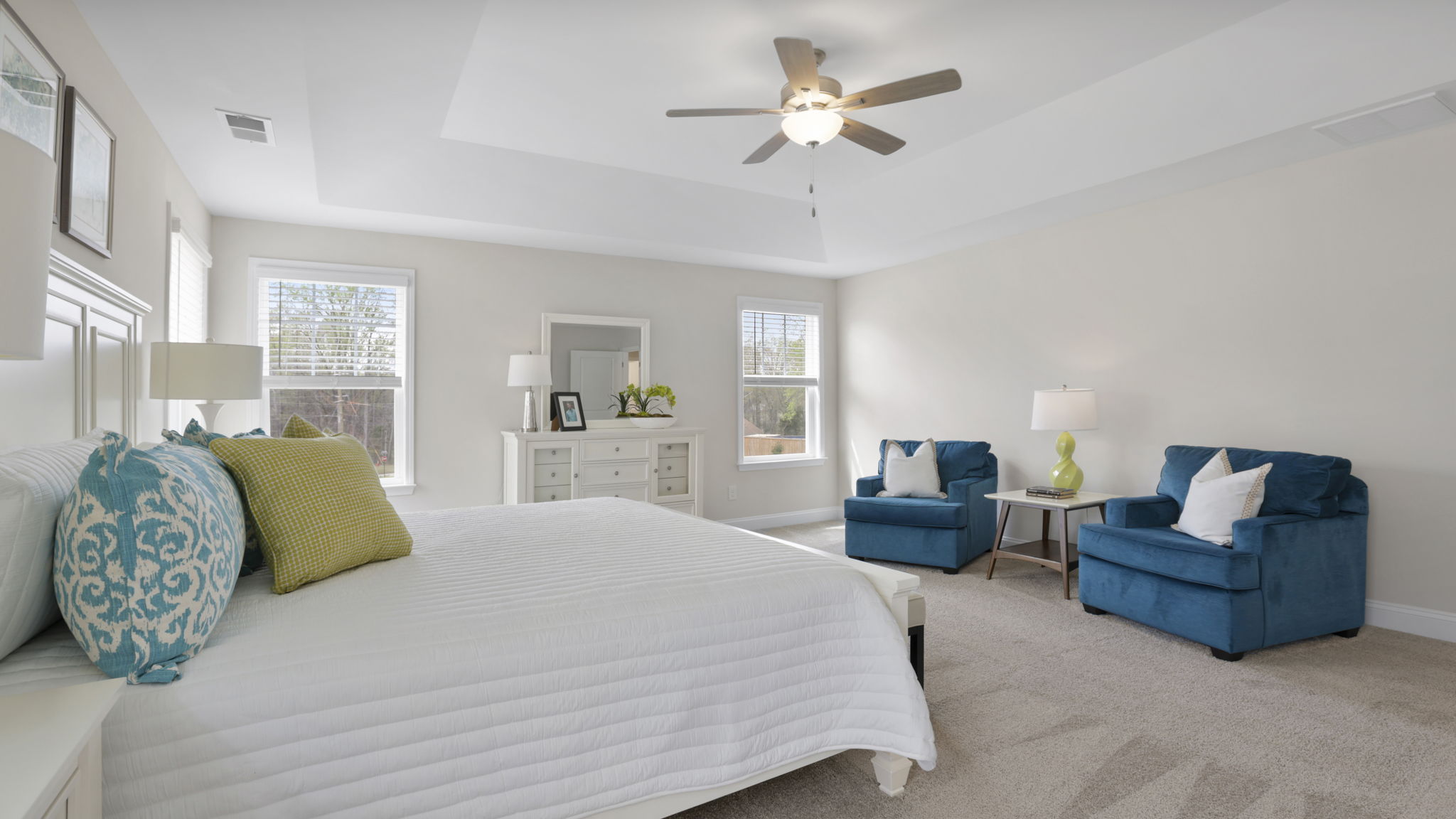 Bedroom with carpet and window.