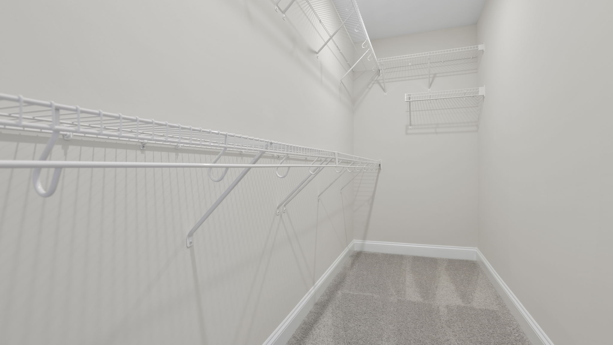 Closet with hanging storage racks.