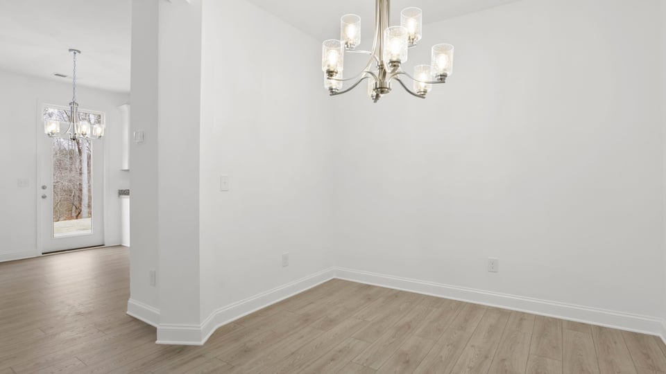 Dining area with light fixture.