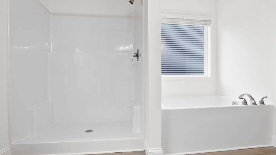 Primary bathroom with double vanity sink.