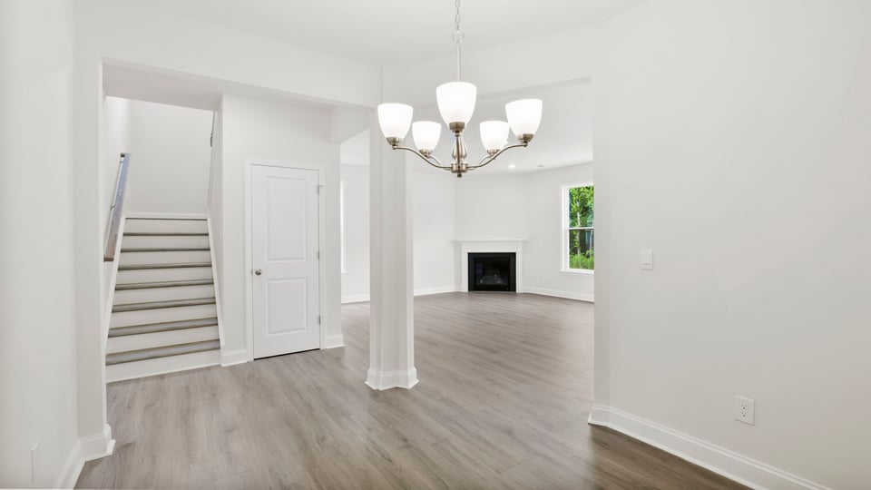 Family room with window and fireplace.