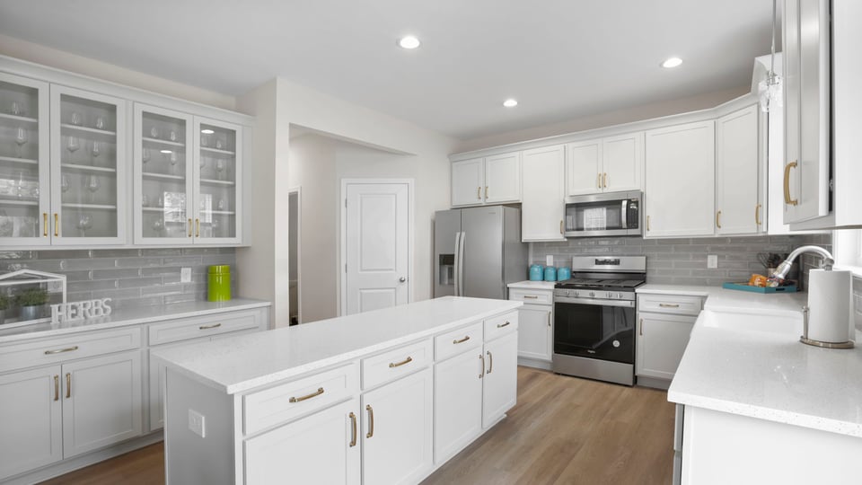 Kitchen with island and cabinets,