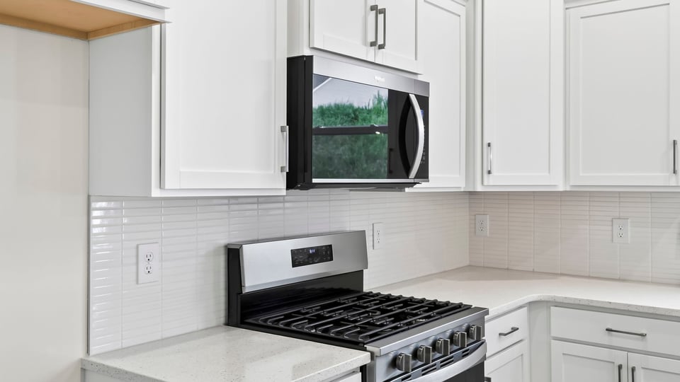 Kitchen with stainless steel appliances.