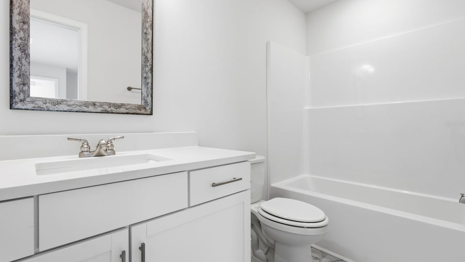 Bathroom with vanity sink.