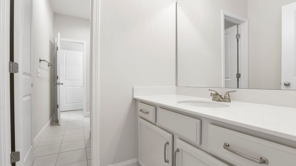 Bathroom with vanity sink.