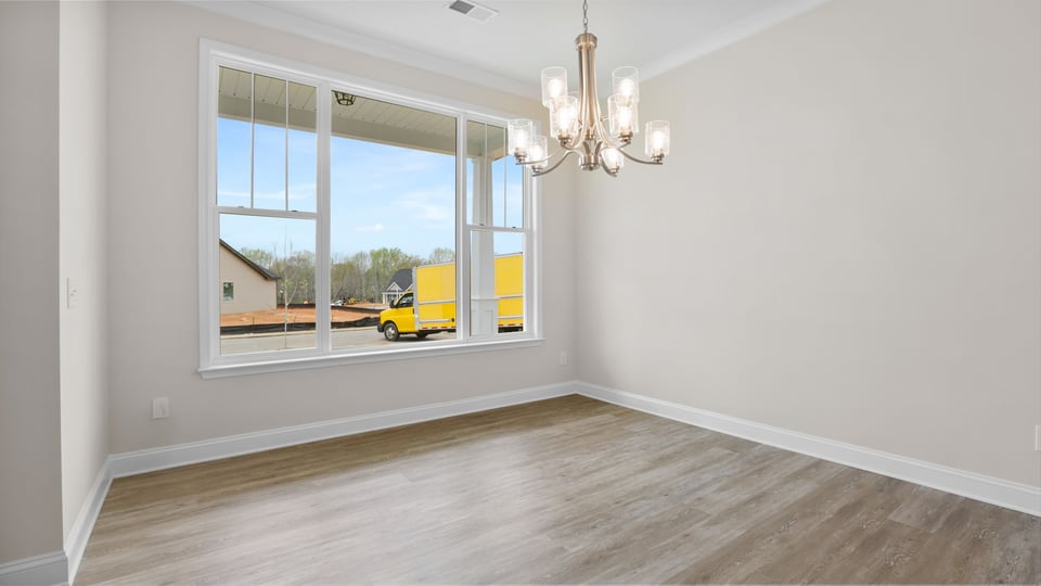 Living area with large windows.
