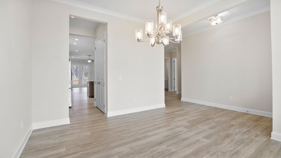Living area with large windows.