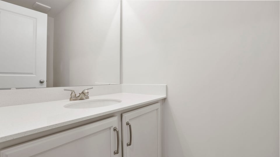 Bathroom with vanity sink.