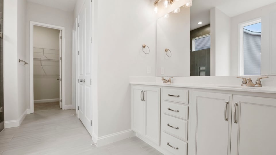Primary bathroom with double vanity sink.