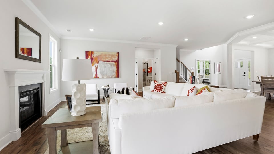Living area with windows and fireplace.