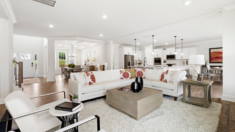 Living area with windows and fireplace.