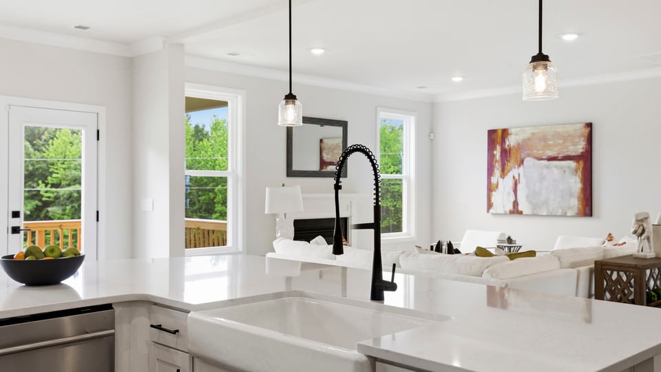 Kitchen with island and cabinets.