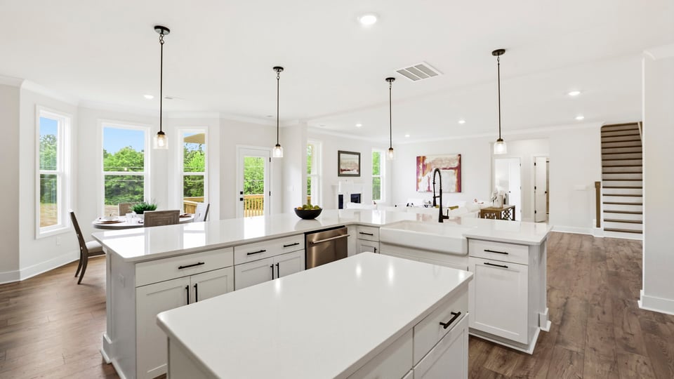 Kitchen with island and cabinets.