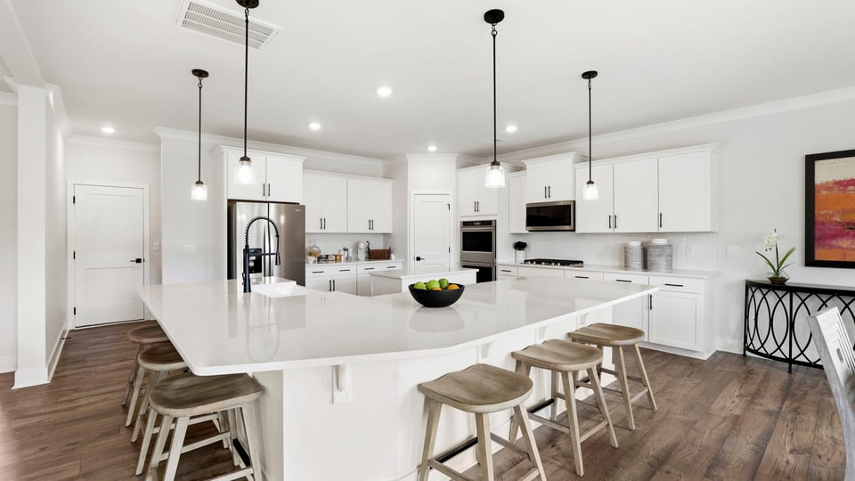 Kitchen with island and cabinets.